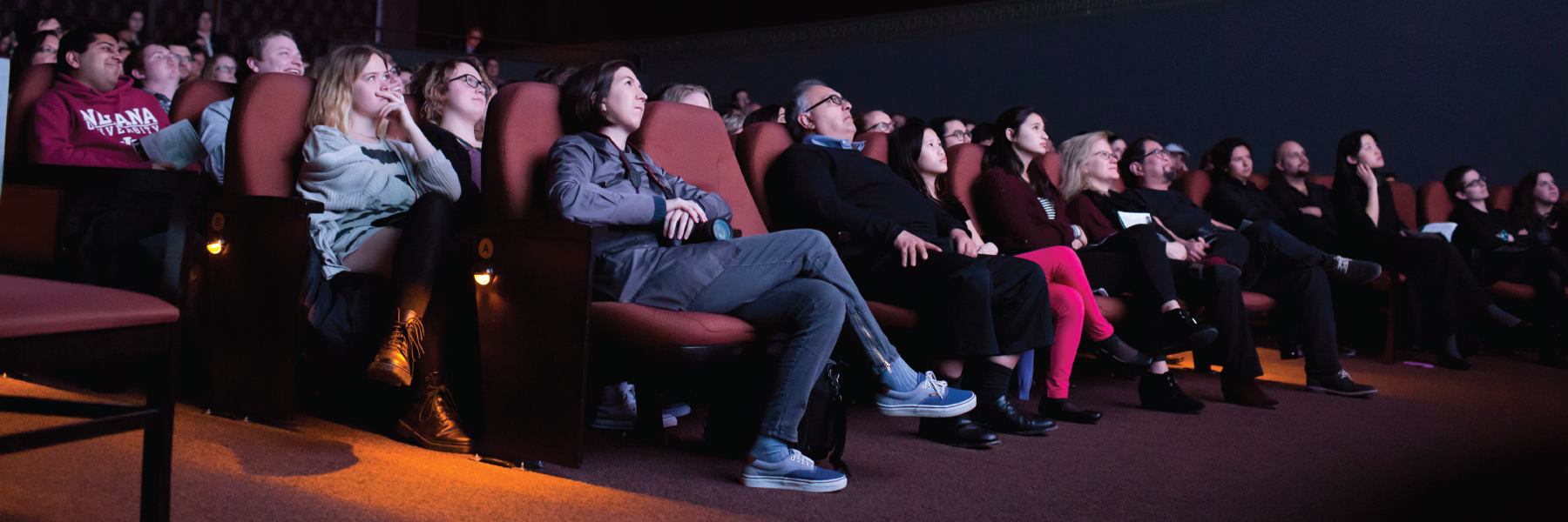Audience members watching a film at IU Cinema